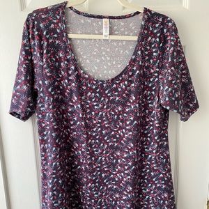 EUC - Medium Lularoe Perfect T - Navy blue with pink floral pattern